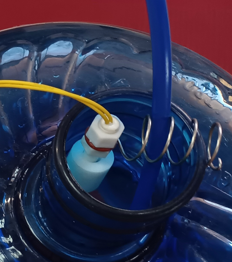Photo purifying water to jug