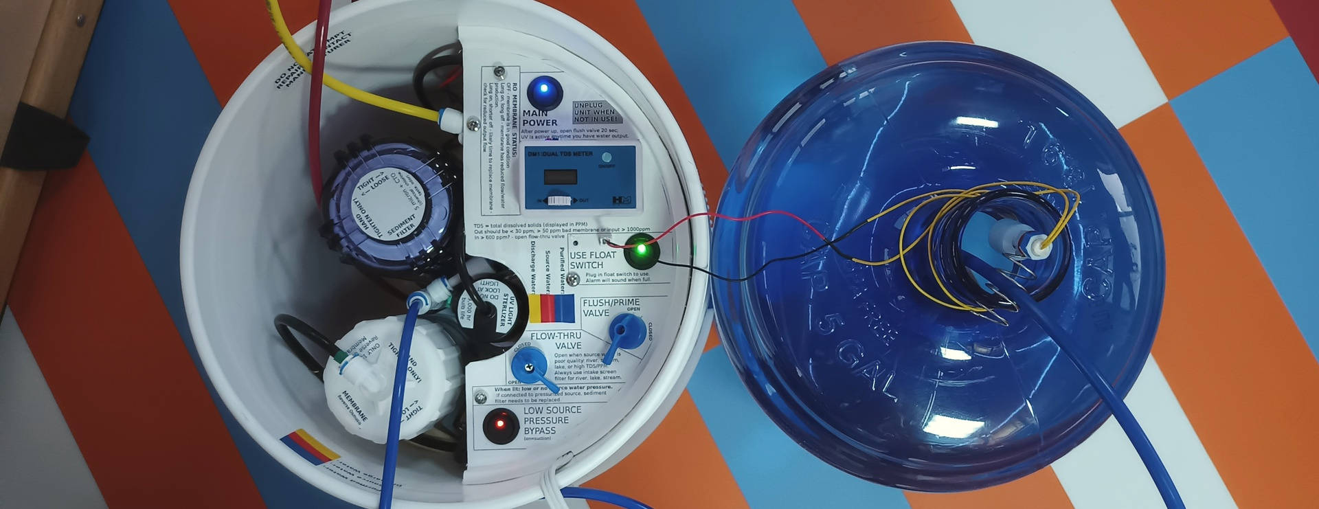 Photo of portable reverse osmosis system filling jug